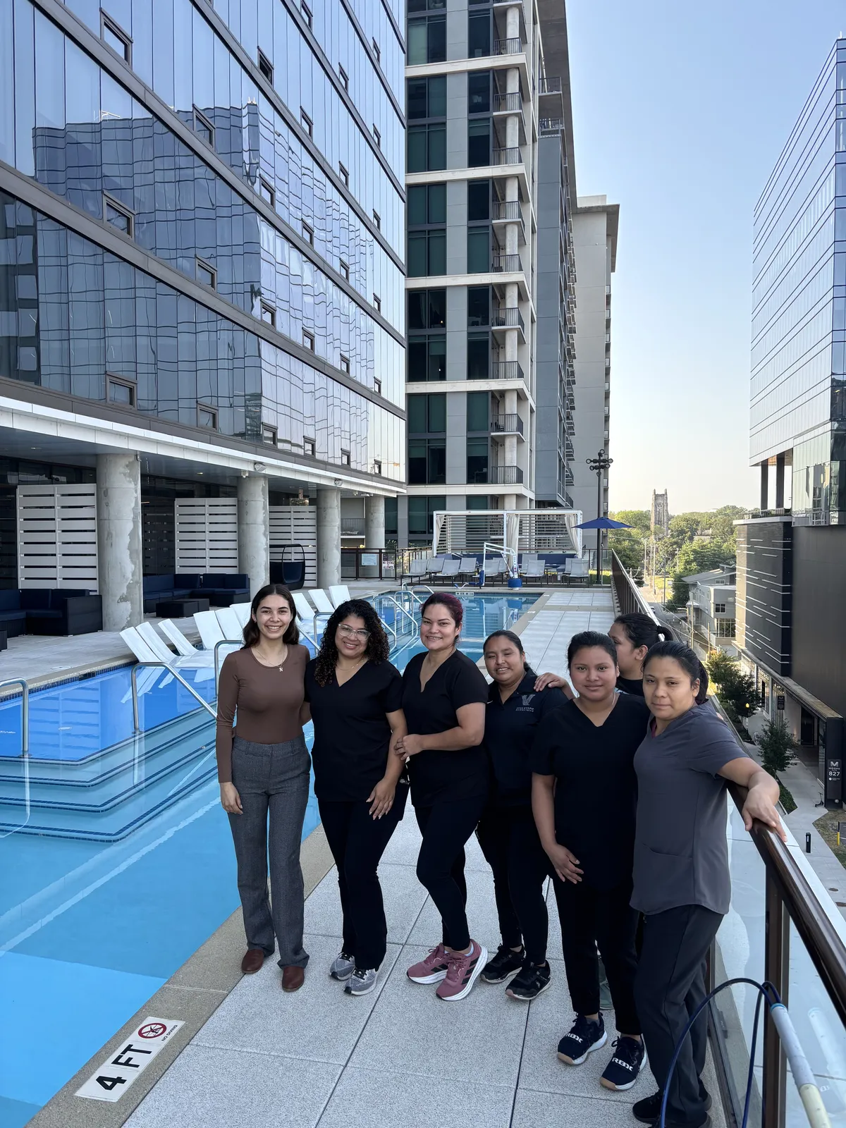 The Fresh Start crew together on a downtown Nashville rooftop, the same team that runs each recurring janitorial route