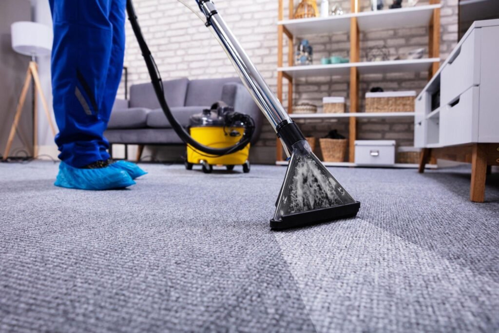 Professional carpet deep cleaning with extraction machine